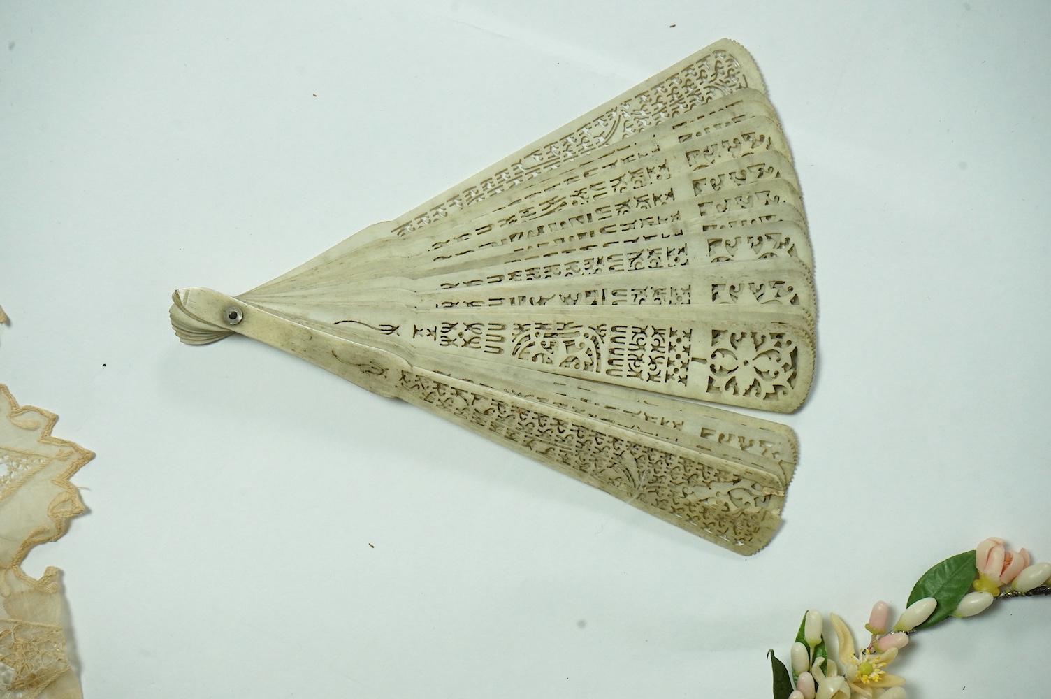 A pair of Victorian silver plated two branch three light candelabra, 54cm high. Condition - fair-good